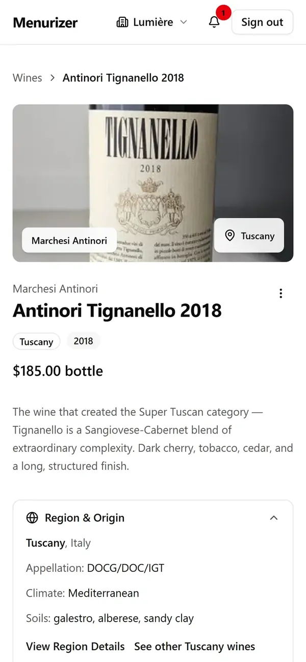 Menurizer on a phone: the catalog page for Antinori Tignanello 2018, with its price, tasting notes and region details.